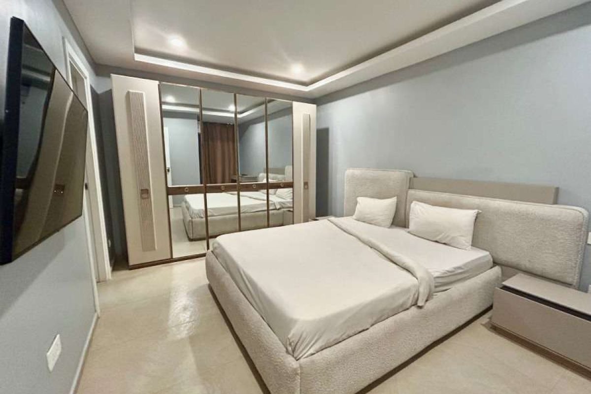 803 - master bedroom with tv -